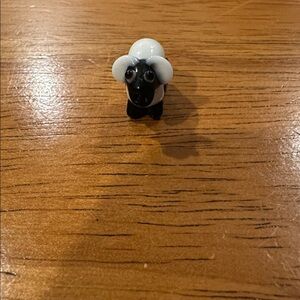 Adorable Black and White Sheep Glass Charm.
 With Silver Lining.
